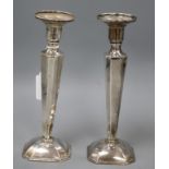 A pair of Chinese white metal candlesticks (a.f.), 22.5cm.