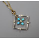 An Edwardian 15ct gold, enamel and turquoise set openwork pendant, on a 15ct gold chain, pendant