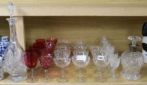 A quantity of glass including cranberry and two decanters (one silver collar)