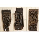 Three antique wood carvings W.50cm approx.