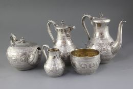 A good Victorian five piece silver tea and coffee service by Frederick Elkington, with engraved