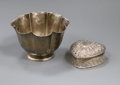 An Edwardian silver sugar bowl and a late Victorian heart shaped silver box by William Comyns.