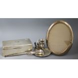 A George III silver chamberstick and snuffer and three other items, the chamberstick London 1783,