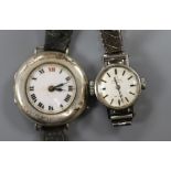 A lady's stainless steel Omega De Ville automatic wrist watch and an early 20th century silver wrist