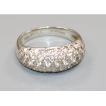 A modern 18ct white gold and pave set diamond dress ring, with a total diamond weight of 2.04cts,