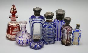 Eight 19th century overlaid glass scent bottles