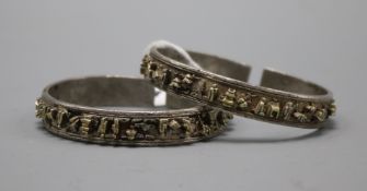 Two Chinese metal bangles.