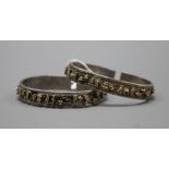 Two Chinese metal bangles.