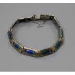 An early 20th century Murrle Bennett white metal and enamel bracelet, stamped "silver" with maker'