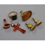 An 8ct gold and bloodstone signet ring, three fob seals, and agate seal and an agate cross pendant.