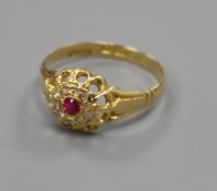 A George V 18ct gold and gem set cluster ring, size O/P.