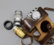 A Leica IIIb camera, No. 284187 and a Leitz Elmar F=9cm 1:4 lens Nr. 1036477