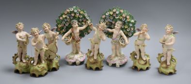 Eight Continental porcelain cherubs