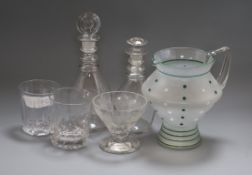 Two early decanters, three glasses and a Deco jug