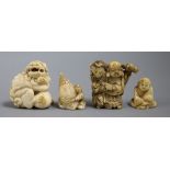 A group of four Japanese ivory or bone netsuke, late 19th/early 20th century