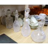 A large French cut glass claret jug, a pair of bottle decanters and two others