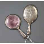 Two silver mounted handbag mirrors including one with pink guilloche enamel, largest 73mm.