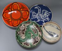A Poole pottery dish and three other pottery dishes