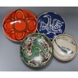 A Poole pottery dish and three other pottery dishes