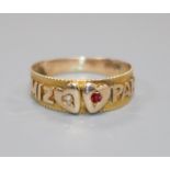 A late Victorian 9ct gold and gem set "Mizpah" ring, size O.