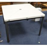 An Italian designer enveleope dining table W.105cm