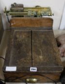 A set of brass and oak weighing scales