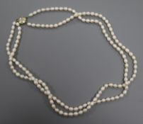 A double-row cultured pearl necklace with diamond-set 14ct yellow and white gold clasp, 66cm.