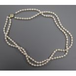 A double-row cultured pearl necklace with diamond-set 14ct yellow and white gold clasp, 66cm.