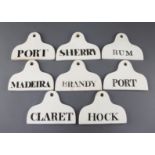 A set of eight creamware pyriform bin labels, 19th century, unmarked w. 13.5cm