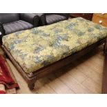 A 19th century Flemish walnut day bed with foliate upholstered cushion W.190cm