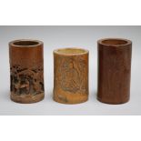 Three Chinese bamboo brush pots, 19th century tallest 14.5cm