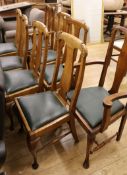 A set of six 1920's Flemish style oak dining chairs and a pair of similar carvers