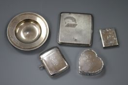Two silver vestas, a silver heart shaped pill box, a silver cigarette case and a small silver Armada