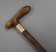 A gold mounted horn handled walking stick