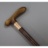 A gold mounted horn handled walking stick