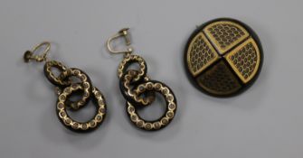 A pair of early 20th century tortoiseshell and pique triple loop earrings and a similar brooch,