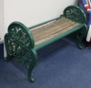 A Coalbrookdale cast iron green painted bench or window seat c.1870 with arched ends cast with