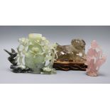 A Chinese celadon jade vase, a rock crystal buffalo and a rose quartz figure