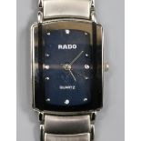 A stainless steel Rado Jubile quartz wristwatch.