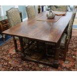 An early 17th century style oak refectory table W.213cm