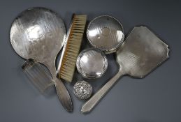 Two silver backed hand mirrors, brush, silver trinket box, a silver pill box and two dressing