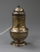 A George II silver bun pepper, by Samuel Wood, 9.8cm.