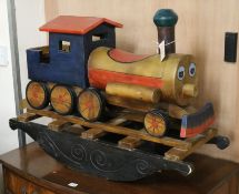 A wooden rocking train W.88cm