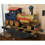 A wooden rocking train W.88cm