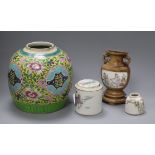 A Chinese famille rose jar, a nest of boxes, a water pot and a wood and porcelain wall pocket