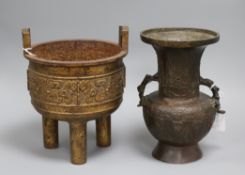 A Chinese archaistic bronze vase and a Chinese cast iron tripod censer tallest 26.5cm