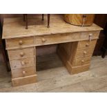 A pine pedestal desk W.120cm