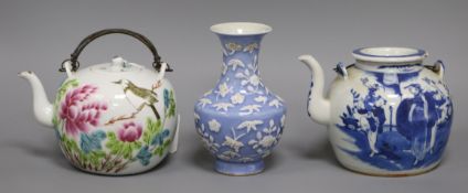 A Chinese famille rose teapot, a blue ground vase and a blue and white teapot, late 19th/early