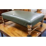 A Victorian green leather upholstered stool W.106cm