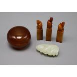A Chinese pale celadon jade figure, a chalcedony box and cover and three soapstone seals
